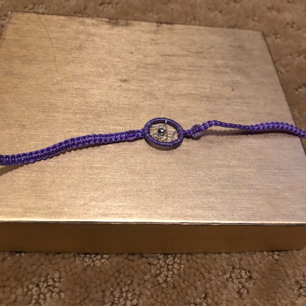 Purple dream catcher string bracelet